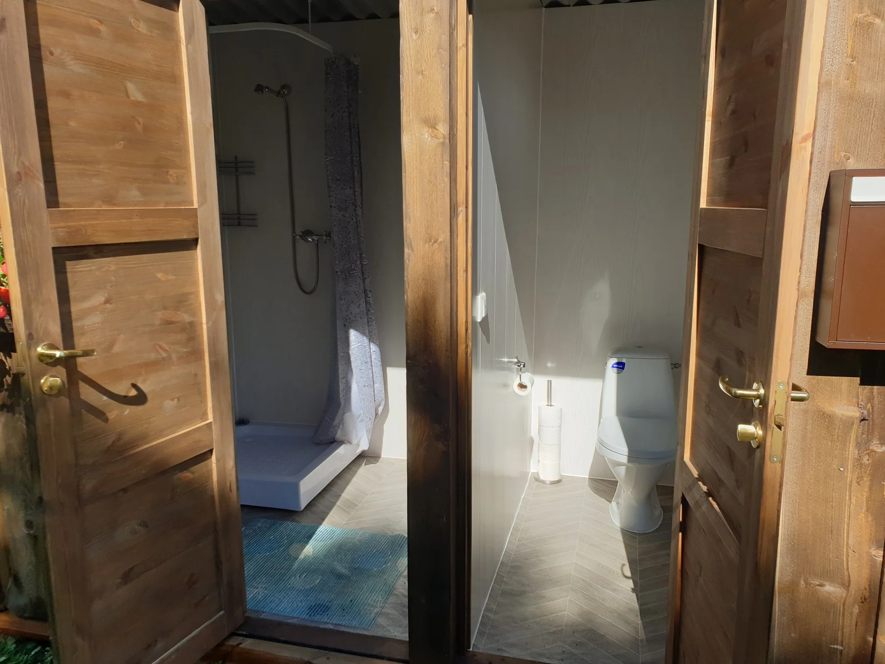 Caravan park shower room and WC in a log building