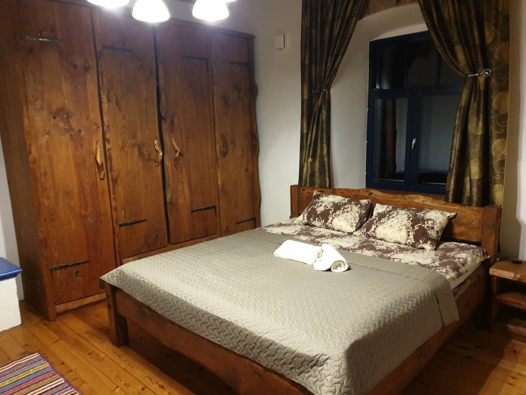 Bedroom with a wooden wardrobe